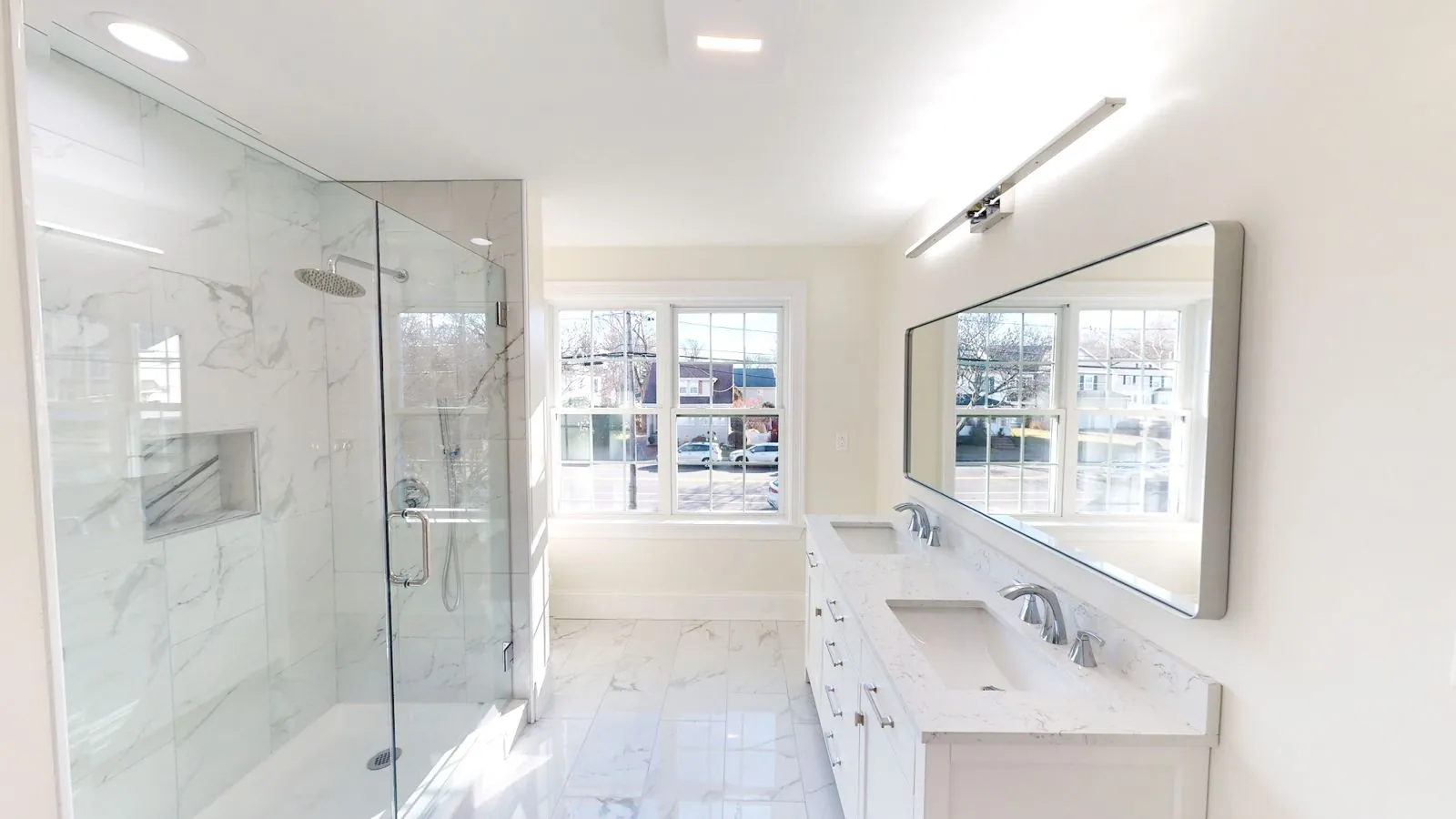 Glass shower, double vanity & large mirror